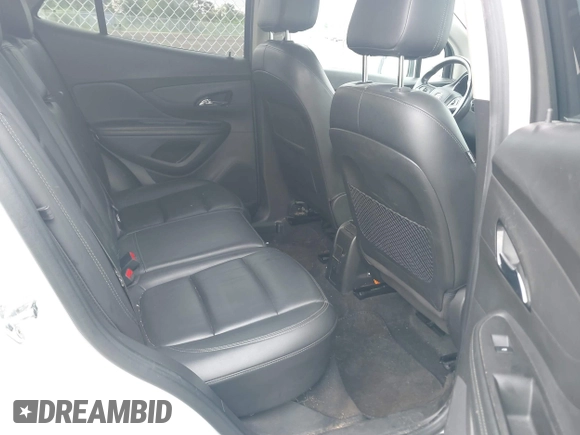 2019 Buick Encore Essence with VIN KL4CJGSM2KB876329, listed as a IAAI auction lot 42101397 with 84,020 mi miles. Bid and sale history available at carsss.com. Image 8.