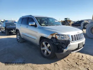 2013 Jeep Grand Cherokee Overland with VIN 1C4RJECG4DC644809, listed as a Copart auction lot 42265005 with 213,493 mi miles and Salvage Title. Bid and sale history available at carsss.com. Image 4.