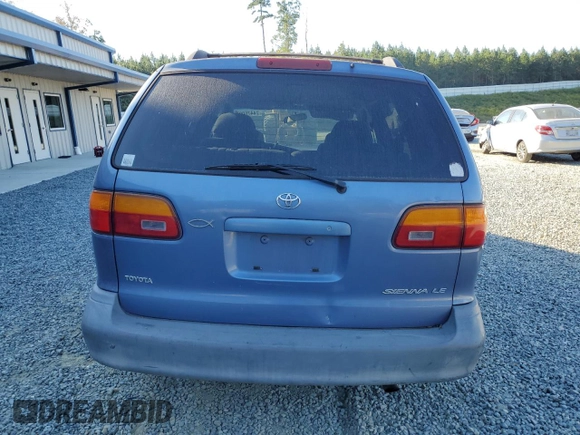 1999 Toyota Sienna LE with VIN 4T3ZF13C8XU108650, listed as a Copart auction lot 74476004 with 215,060 mi miles and Salvage Title. Bid and sale history available at carsss.com. Image 6.