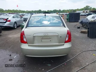2006 Hyundai Accent GLS with VIN KMHCN46C26U037605, listed as a IAAI auction lot 42431996 with 86,128 mi miles and . Bid and sale history available at DreamBid. Image 16.