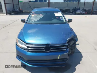 2016 Volkswagen Jetta Sedan 1.4T SE with VIN 3VWD67AJ8GM218112, listed as a IAAI auction lot 42061478 with 84,860 mi miles. Bid and sale history available at carsss.com. Image 13.