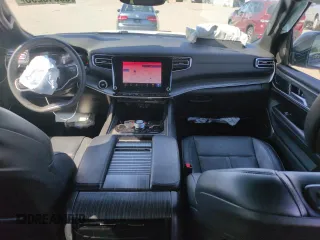 2023 Jeep Wagoneer Series III с VIN 1C4SJSDP8PS540588, выставлен на аукционе Copart как лот 56546295 с пробегом 47 041 миль миль и Списание • Salvage title. История ставок и продаж доступна на DreamBid. Изображение 8.