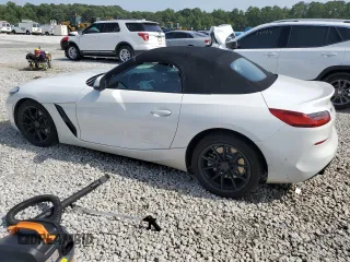 2020 BMW Z4 sDrive30i with VIN WBAHF3C06LWW83982, listed as a Copart auction lot 66076064 with 71,855 mi miles and Salvage Title. Bid and sale history available at carsss.com. Image 2.