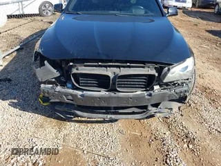 2013 BMW 5 Series 535i with VIN WBAFR7C57DC817337, listed as a IAAI auction lot 41265667 with 148,953 mi miles and . Bid and sale history available at DreamBid. Image 12.
