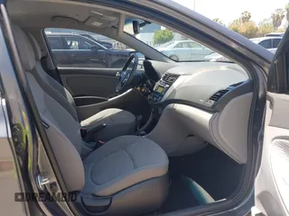 2013 Hyundai Accent GLS z VIN KMHCU4AE9DU427450, wystawiony jako IAAI lot #42415750 z przebiegiem 105 890 mil mil oraz . Historia ofert i sprzedaży dostępna na DreamBid. Obrazek 5.