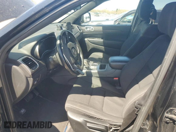 2018 Jeep Grand Cherokee Laredo E with VIN 1C4RJFAGXJC427382, listed as a Copart auction lot 54518805 with 68,356 mi miles and Salvage Title. Bid and sale history available at DreamBid. Image 7.