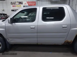 2006 Honda Ridgeline RTL with VIN 2HJYK16546H520899, listed as a IAAI auction lot 41899874 with 3,202,741 mi miles. Bid and sale history available at carsss.com. Image 14.