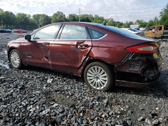 2016 Ford Fusion SE Hybrid z VIN 3FA6P0LU5GR377735, wystawiony jako Copart lot #58791955 z przebiegiem 135 798 mil mil oraz Szkoda całkowita • Salvage title. Historia ofert i sprzedaży dostępna na DreamBid. Obrazek 2.