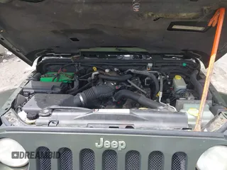 2008 Jeep Wrangler Sahara with VIN 1J4FA54178L647426, listed as a IAAI auction lot 42496322 with 157,016 mi miles and . Bid and sale history available at DreamBid. Image 10.