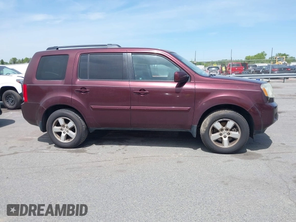 2011 Honda Pilot EX-L with VIN 5FNYF4H59BB090116, listed as a IAAI auction lot 42048811 with 158,857 mi miles and . Bid and sale history available at carsss.com. Image 12.