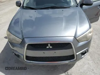 2011 Mitsubishi Outlander SE z VIN JA4AR4AU1BZ011732, wystawiony jako Copart lot #60986055 z przebiegiem Nie podano mil oraz Czysty tytuł • Clean title. Historia ofert i sprzedaży dostępna na DreamBid. Obrazek 12.