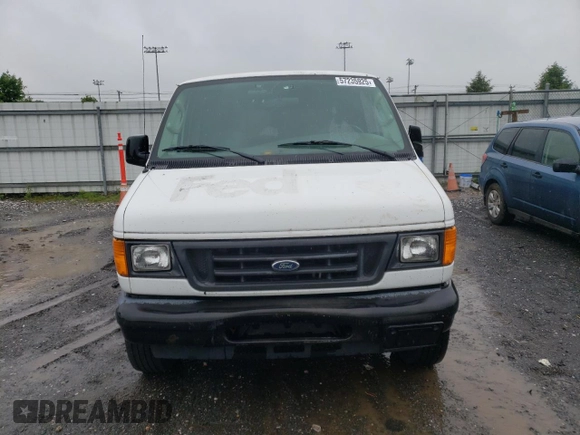 2007 Ford Econoline Cargo Commercial z VIN 1FTNE24WX7DB07027, wystawiony jako Copart lot #57235925 z przebiegiem 129 955 mil mil oraz Czysty tytuł • Clean title. Historia ofert i sprzedaży dostępna na DreamBid. Obrazek 5.