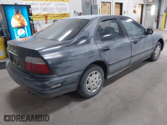 1997 Honda Accord DX with VIN 1HGCD5621VA005525, listed as a IAAI auction lot 42218121 with 196,053 mi miles and . Bid and sale history available at carsss.com. Image 4.