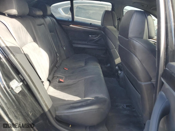 2014 BMW M5 with VIN WBSFV9C52ED593005, listed as a Copart auction lot 73960374 with 71,154 mi miles and Salvage Title. Bid and sale history available at carsss.com. Image 10.