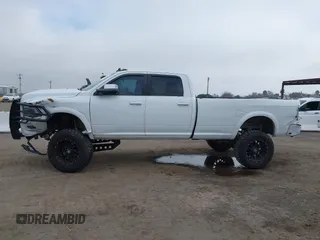 2014 Ram 2500 with VIN 3C6TR5KT3EG309771, listed as a IAAI auction lot 41213964 with 136,617 mi miles and . Bid and sale history available at DreamBid. Image 15.