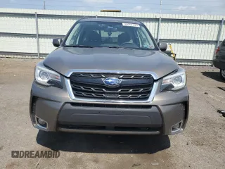 2017 Subaru Forester Touring with VIN JF2SJGWC9HH402713, listed as a Copart auction lot 62257345 with 128,903 mi miles and Salvage title. Bid and sale history available at DreamBid. Image 5.