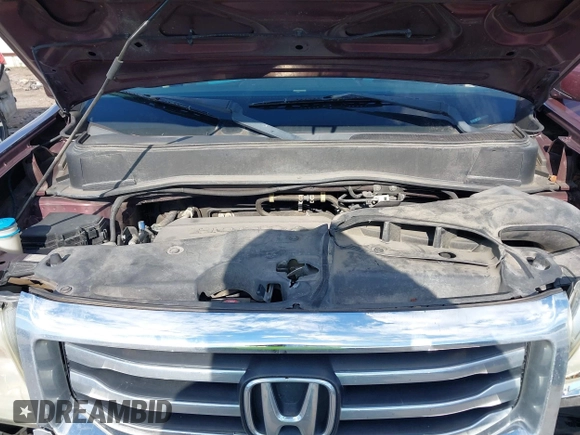 2013 Honda Pilot EX-L with VIN 5FNYF3H58DB032933, listed as a IAAI auction lot 42213061 with 166,496 mi miles and . Bid and sale history available at DreamBid. Image 10.