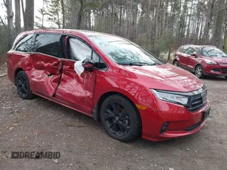 2023 Honda Odyssey Sport z VIN 5FNRL6H7XPB043162, wystawiony jako IAAI lot #41370860 z przebiegiem 26 462 mil mil oraz . Historia ofert i sprzedaży dostępna na DreamBid. Obrazek 1.
