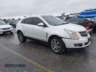 2012 Cadillac SRX Performance Collection with VIN 3GYFNEE33CS528697, listed as a IAAI auction lot 41374060 with 157,319 mi miles and . Bid and sale history available at DreamBid. Image 1.