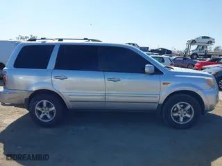 2007 Honda Pilot EX-L with VIN 5FNYF28617B036992, listed as a IAAI auction lot 41861449 with 159,439 mi miles. Bid and sale history available at carsss.com. Image 13.