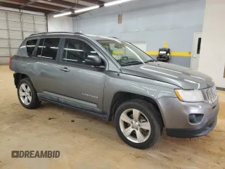 2012 Jeep Compass Sport with VIN 1C4NJCBB2CD505361, listed as a Copart auction lot 48041505 with 167,464 mi miles and Salvage Title. Bid and sale history available at carsss.com. Image 4.
