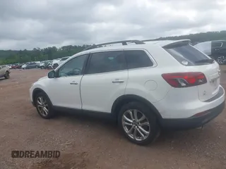 2013 Mazda CX-9 Grand Touring z VIN JM3TB2DA6D0414080, wystawiony jako IAAI lot #42310153 z przebiegiem 190 991 mil mil oraz . Historia ofert i sprzedaży dostępna na DreamBid. Obrazek 14.