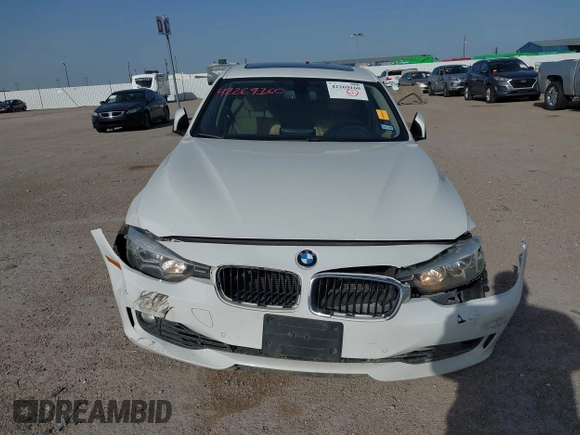 2014 BMW 3 Series 328i with VIN WBA3A5G5XENP32345, listed as a IAAI auction lot 42303835 with 100,235 mi miles and . Bid and sale history available at DreamBid. Image 12.