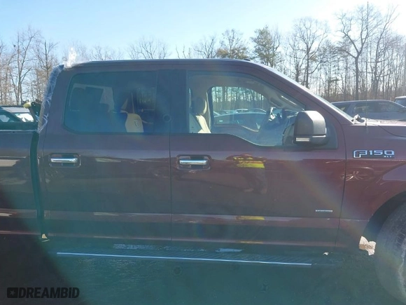 2015 Ford F-150 XLT w/HD Payload Pkg with VIN 1FTFW1EG9FFC44739, listed as a IAAI auction lot 41193582 with 121,169 mi miles. Bid and sale history available at carsss.com. Image 13.