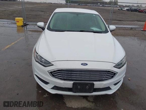 2017 Ford Fusion S with VIN 3FA6P0G72HR337120, listed as a IAAI auction lot 42173384 with 133,320 mi miles and . Bid and sale history available at DreamBid. Image 6.