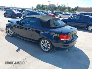 2013 BMW 1 Series 135i with VIN WBAUN7C56DVM27224, listed as a IAAI auction lot 41662583 with 83,335 mi miles. Bid and sale history available at carsss.com. Image 3.