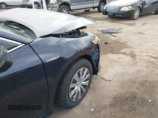 2021 Toyota Camry Hybrid LE with VIN 4T1C31AKXMU565585, listed as a IAAI auction lot 41057955 with 31,976 mi miles. Bid and sale history available at carsss.com. Image 6.