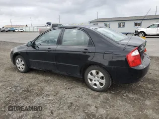 2006 Kia Spectra EX with VIN KNAFE121765363296, listed as a Copart auction lot 48929955 with 174,666 mi miles and Salvage Title. Bid and sale history available at carsss.com. Image 2.