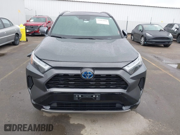 2024 Toyota RAV4 Hybrid SE with VIN 2T3T6RFV0RW055852, listed as a IAAI auction lot 41804088 with 36,428 mi miles and . Bid and sale history available at DreamBid. Image 13.