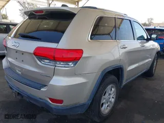 2014 Jeep Grand Cherokee Laredo with VIN 1C4RJFAG7EC380544, listed as a IAAI auction lot 42021130 with 166,589 mi miles. Bid and sale history available at carsss.com. Image 4.