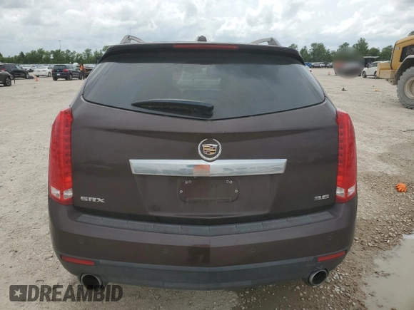 2015 Cadillac SRX Performance Collection with VIN 3GYFNCE38FS571733, listed as a Copart auction lot 54946215 with 147,343 mi miles and Salvage title. Bid and sale history available at DreamBid. Image 6.
