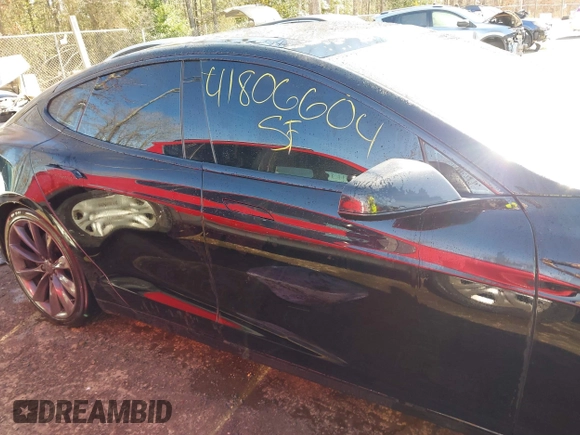 2014 Tesla Model S 60 with VIN 5YJSA1H1XEFP34226, listed as a IAAI auction lot 41806604 with 216,021 mi miles and . Bid and sale history available at DreamBid. Image 13.