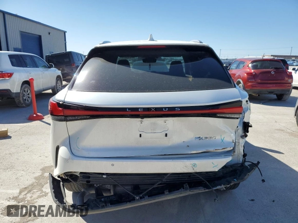 2023 Lexus RX with VIN JTJCHMAA4P2006710, listed as a Copart auction lot 47495525 with 0 mi miles and Salvage Title. Bid and sale history available at carsss.com. Image 6.