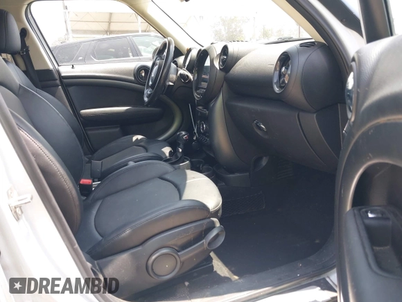 2016 MINI Countryman S with VIN WMWZC3C51GWT10248, listed as a IAAI auction lot 42359191 with 77,157 mi miles and . Bid and sale history available at DreamBid. Image 5.