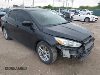 2018 Ford Focus SE with VIN 1FADP3F28JL302634, listed as a IAAI auction lot 42103219 with 71,682 mi miles and . Bid and sale history available at DreamBid. Image 1.