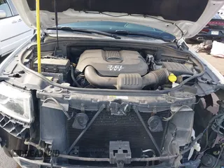 2014 Jeep Grand Cherokee Laredo with VIN 1C4RJEAG3EC125478, listed as a IAAI auction lot 41938499 with 167,588 mi miles and . Bid and sale history available at DreamBid. Image 10.