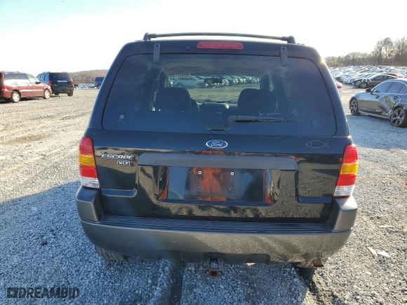 2004 Ford Escape XLT with VIN 1FMYU031X4KB40235, listed as a Copart auction lot 88357735 with 186,797 mi miles and Salvage Title. Bid and sale history available at carsss.com. Image 6.