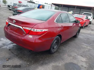 2015 Toyota Camry XLE with VIN 4T1BF1FK2FU982570, listed as a IAAI auction lot 41629755 with 245,224 mi miles. Bid and sale history available at carsss.com. Image 4.