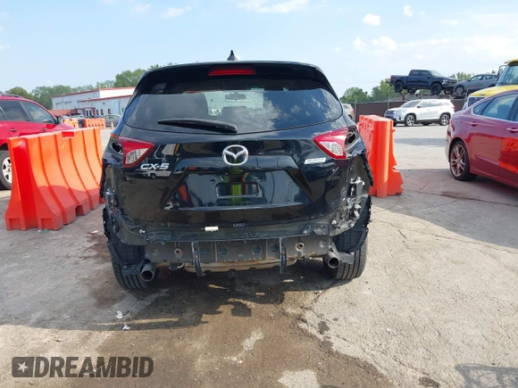 2016 Mazda CX-5 Touring with VIN JM3KE2CY5G0653108, listed as a IAAI auction lot 37717249 with 90,704 mi miles and . Bid and sale history available at DreamBid. Image 6.