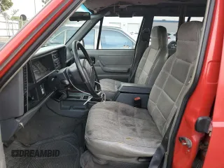 1996 Jeep Cherokee Sport with VIN 1J4FT68S8TL232241, listed as a Copart auction lot 82170904 with 287,125 mi miles and Salvage Title. Bid and sale history available at carsss.com. Image 7.