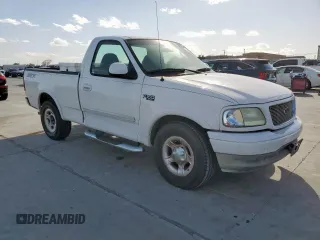 2003 Ford F-150 XL with VIN 2FTRF172X3CA73537, listed as a Copart auction lot 50009865 with 184,923 mi miles and Clean title. Bid and sale history available at DreamBid. Image 4.