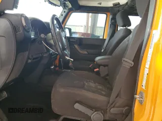 2013 Jeep Wrangler Unlimited Sport z VIN 1C4BJWDGXDL556580, wystawiony jako Copart lot #55477185 z przebiegiem 71 044 mil mil oraz Szkoda całkowita • Salvage title. Historia ofert i sprzedaży dostępna na DreamBid. Obrazek 7.