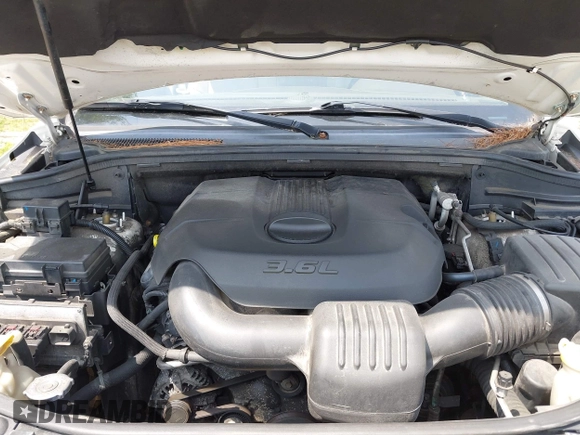 2011 Jeep Grand Cherokee Overland with VIN 1J4RR6GG3BC587857, listed as a IAAI auction lot 42879845 with 165,572 mi miles and . Bid and sale history available at DreamBid. Image 10.