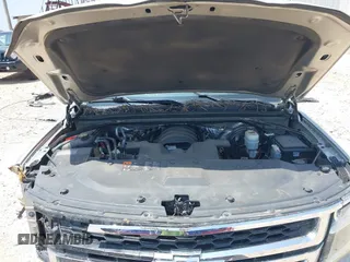 2015 Chevrolet Tahoe LS with VIN 1GNSCAKC9FR294832, listed as a IAAI auction lot 39274877 with 126,932 mi miles and . Bid and sale history available at DreamBid. Image 10.