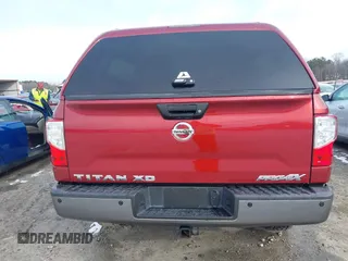 2016 Nissan Titan XD PRO-4X with VIN 1N6BA1F47GN515917, listed as a IAAI auction lot 41355875 with 95,793 mi miles. Bid and sale history available at carsss.com. Image 17.