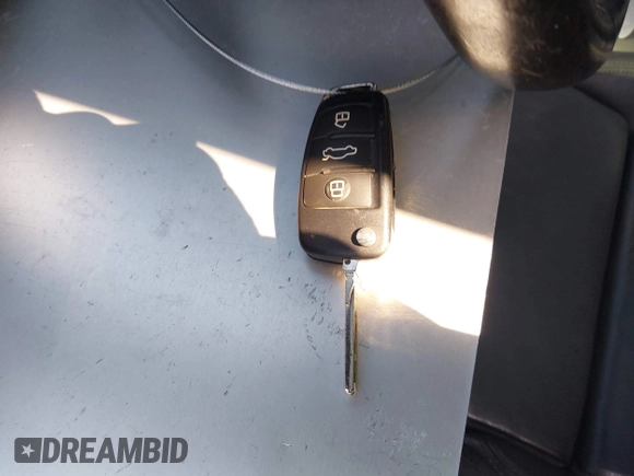 2016 Audi Q3 Premium Plus with VIN WA1BFCFS0GR014028, listed as a IAAI auction lot 42274987 with 64,667 mi miles and . Bid and sale history available at DreamBid. Image 11.